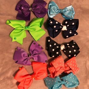 9 women's or girl's Hair Bows. perfect for cheer